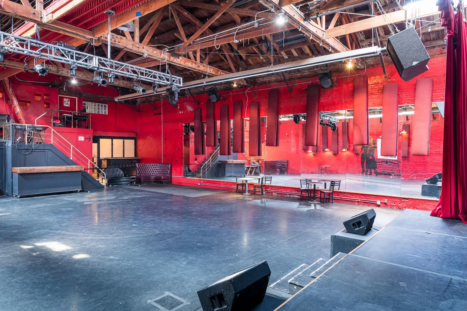 Bow truss ceiling and lighting rig over the ballroom floor